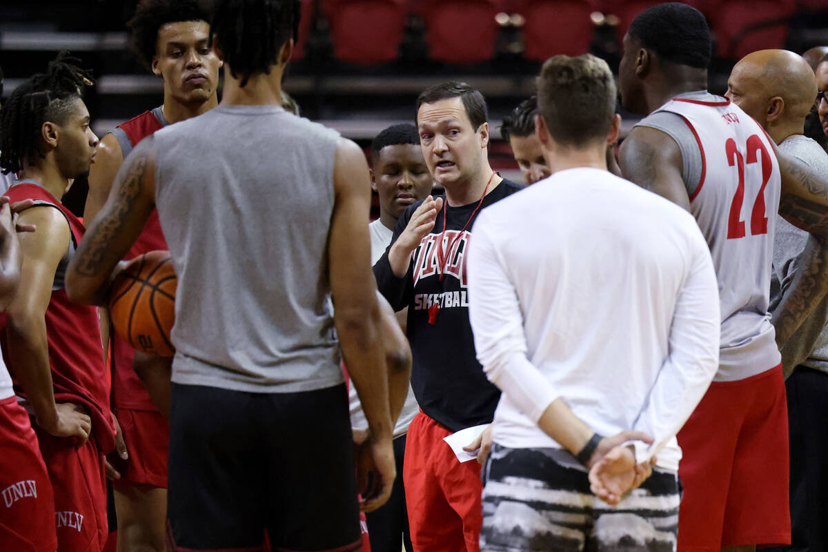 UNLV basketball coach Kevin Kruger interacts with his players during practice at Thomas & M ...