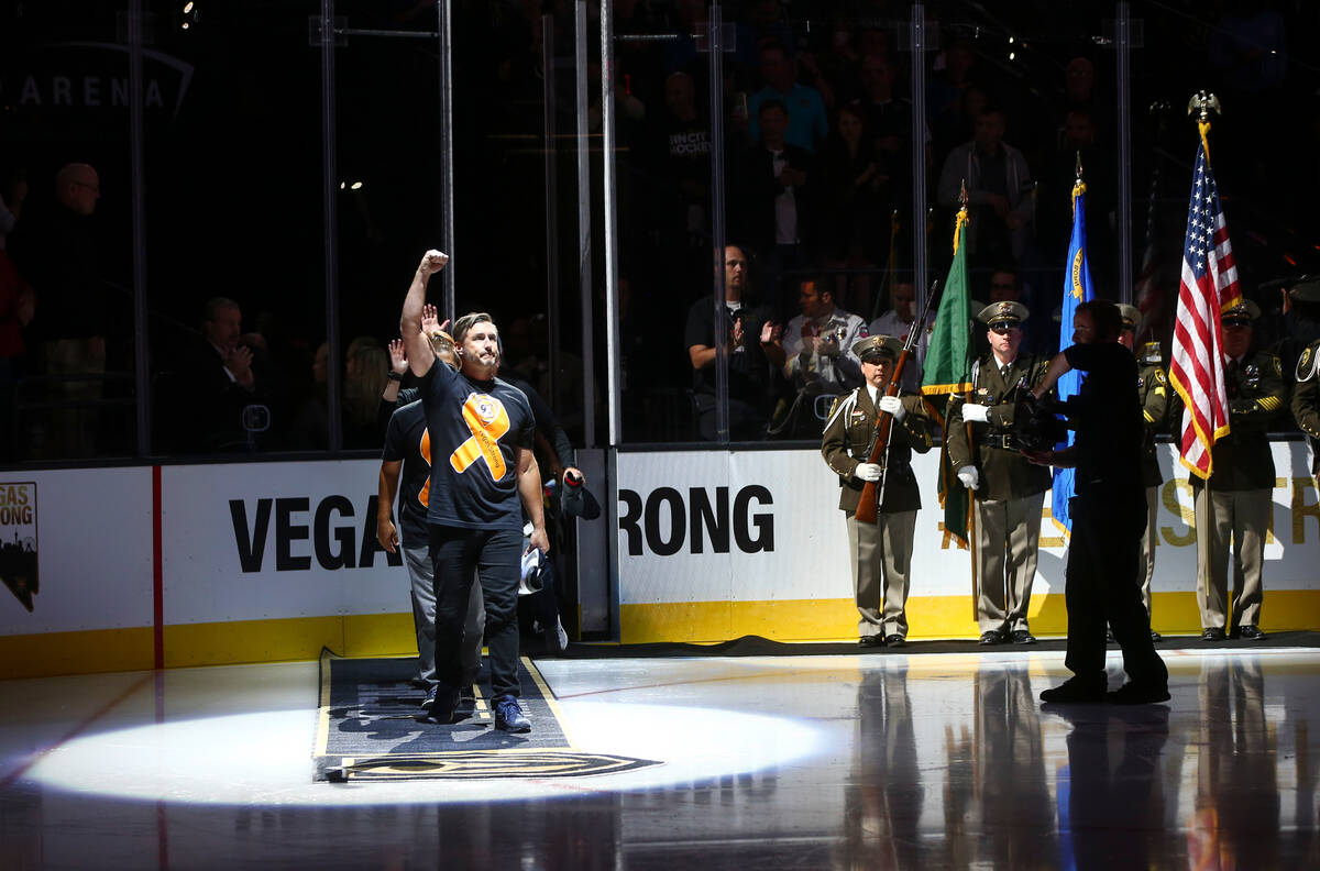 Members of the Route 91 festival team are introduced before an NHL hockey game between the Vega ...