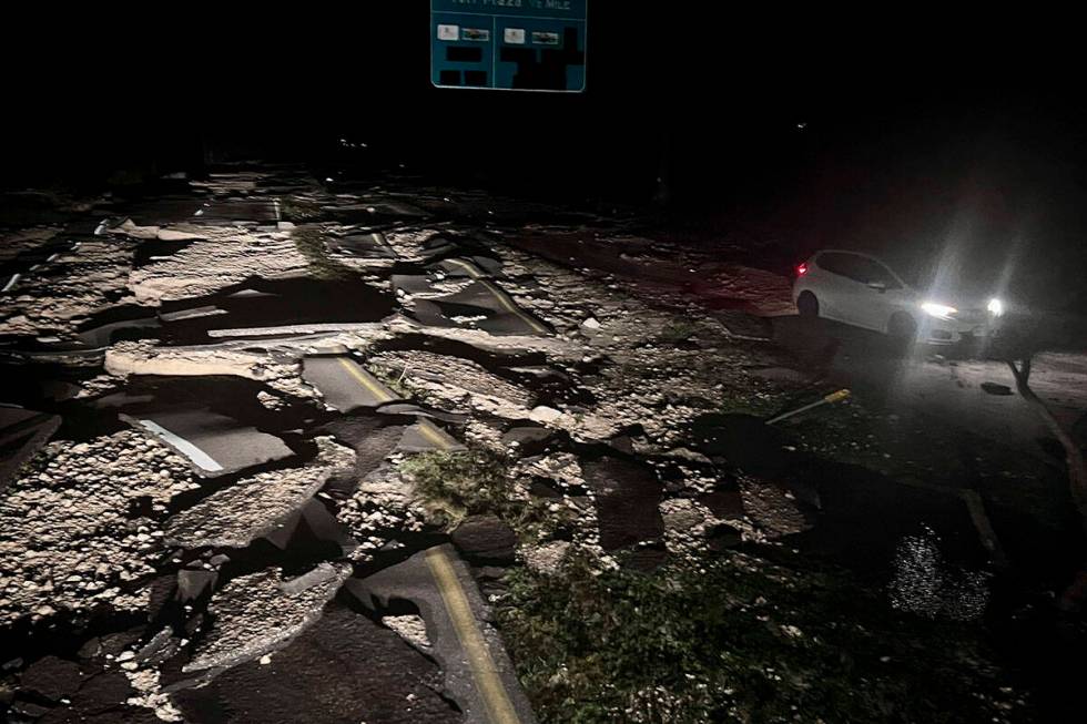 The pavement just before the causeway to Sanibel is damage by a storm surge from Hurricane Ian ...