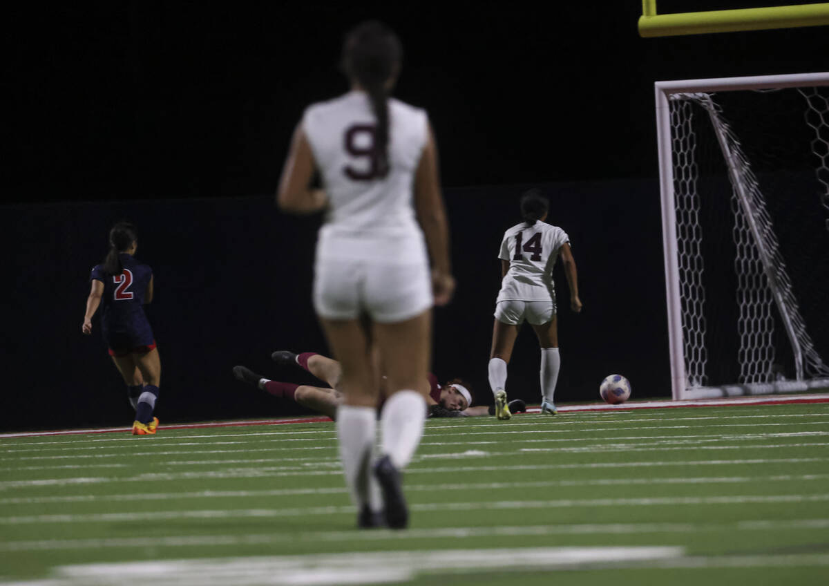 Liberty's Natalie Collins (2) sends the ball past Desert Oasis to score a goal during a soccer ...