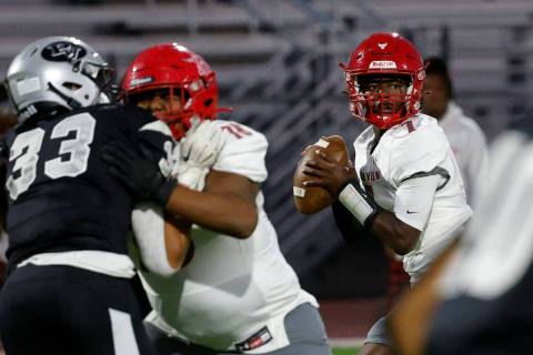 Arbor View’s quarterback Michael Kearns (7) looks to throw the ball during the first hal ...
