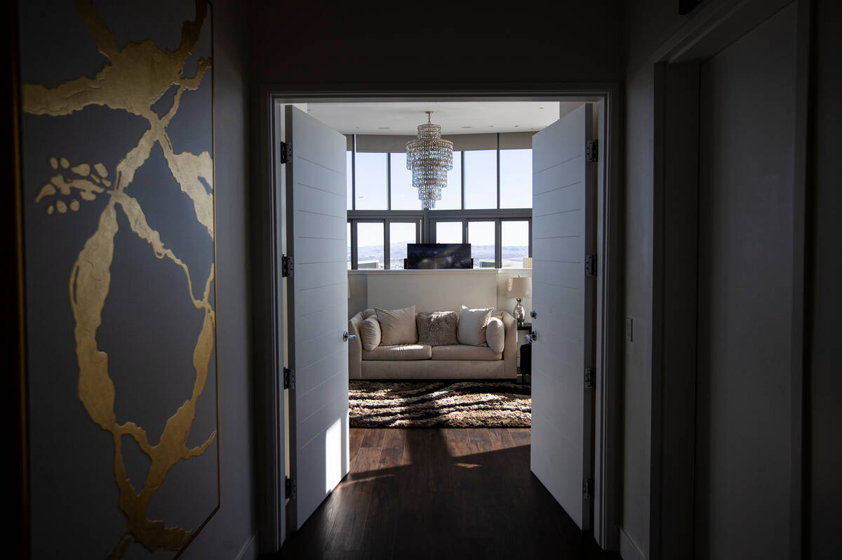 Doors leading to the master suite are seen at the Palms Place penthouse locator on the entire t ...