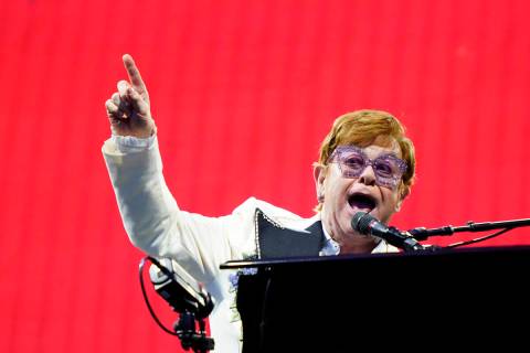 FILE - Elton John performs during his "Farewell Yellow Brick Road," tour, Friday, Jul ...
