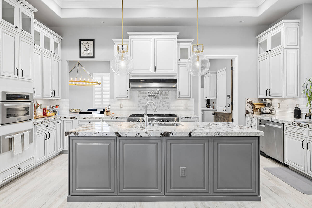 The kitchen features granite countertops. (Napoli Group)