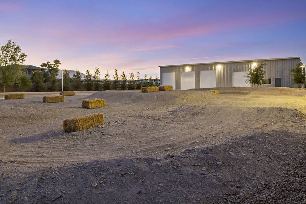 In front of the garage, is a mini motocross track for dirt bikes. (Napoli Group)