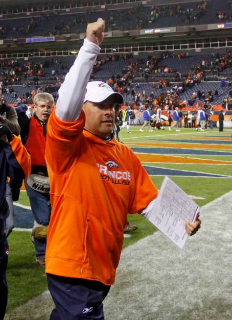Denver Broncos head coach Josh McDaniels reacts as he leaves the field after Denver defeated Ne ...