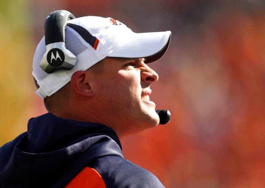 Denver Broncos head coach Josh McDaniels looks on against the New York Jets during the first ha ...