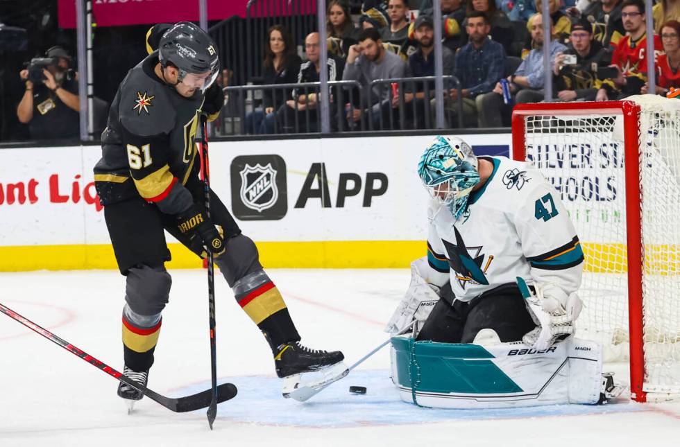 Golden Knights right wing Mark Stone (61) looks for the rebound shot as San Jose Sharks goalten ...