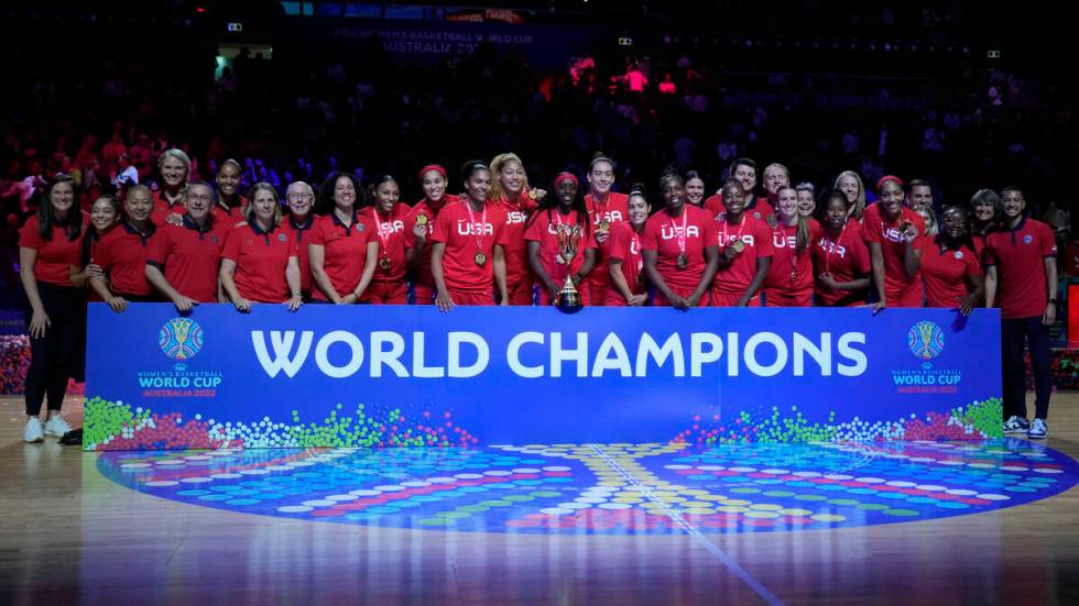 Gold medalists the United States pose for photo after defeating China in the final at the women ...