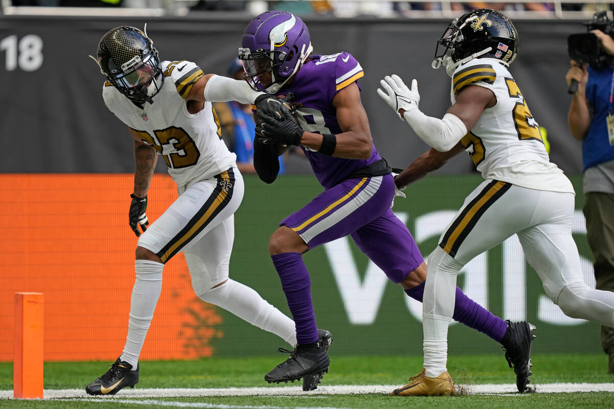Minnesota Vikings wide receiver Justin Jefferson (18) is stopped just short of the end zone dur ...