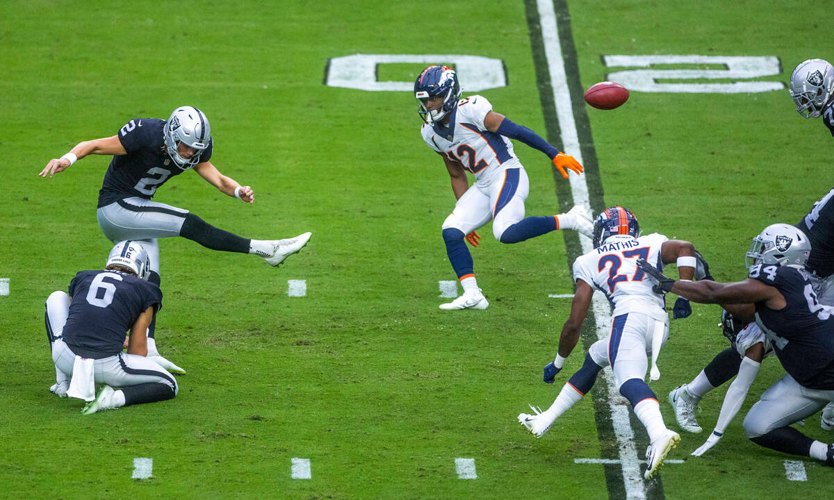 Raiders place kicker Daniel Carlson (2) kicks another field goal as Denver Broncos wide receive ...