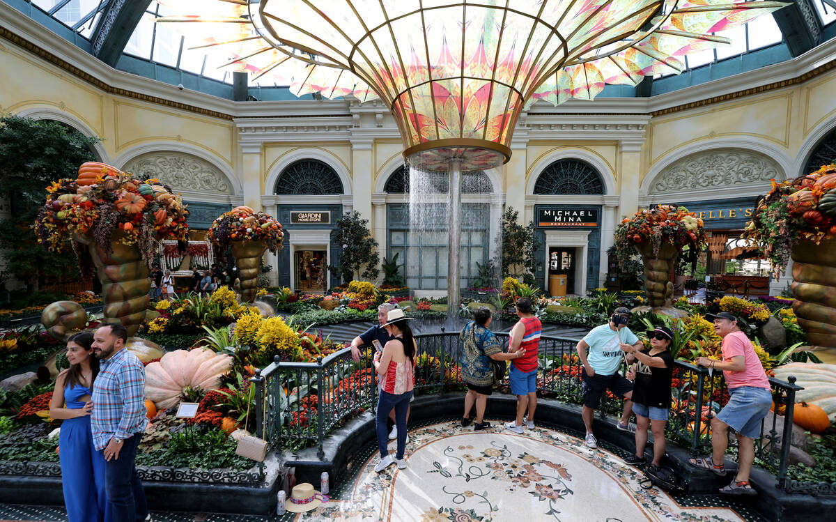 Guests take in the “Artfully Autumn” at Bellagio Conservatory & Botanical Gar ...