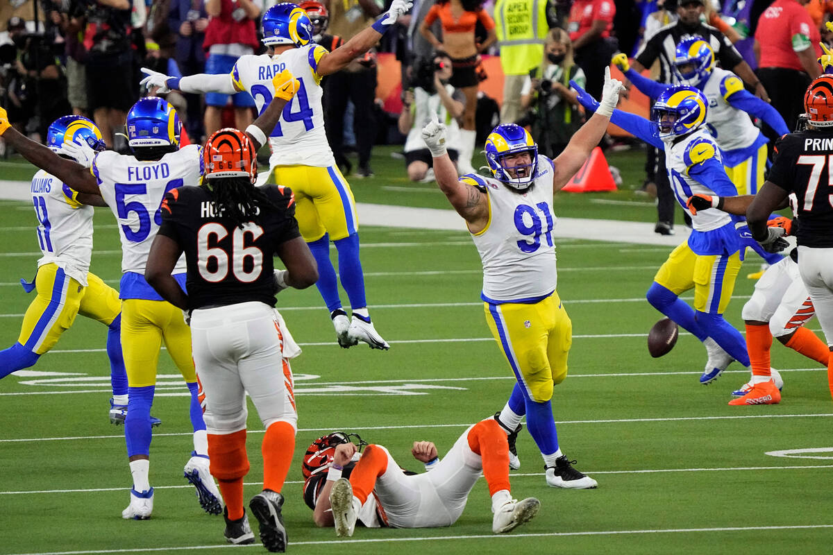 Los Angeles Rams nose tackle Greg Gaines (91) celebrates the tackle of Cincinnati Bengals quart ...