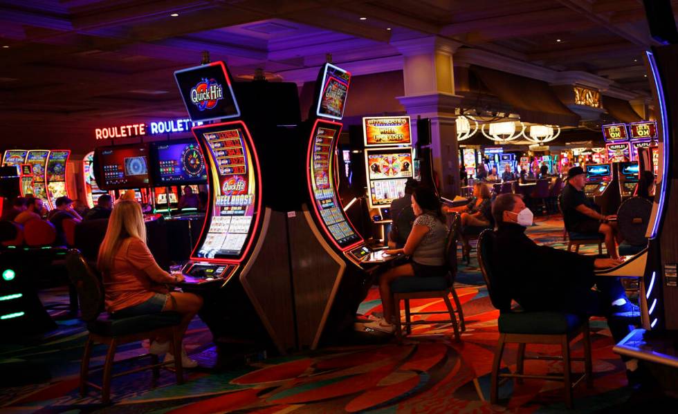 People play slot machines at the Bellagio, Thursday, Oct. 6, 2022, in Las Vegas. (Chitose Suzuk ...