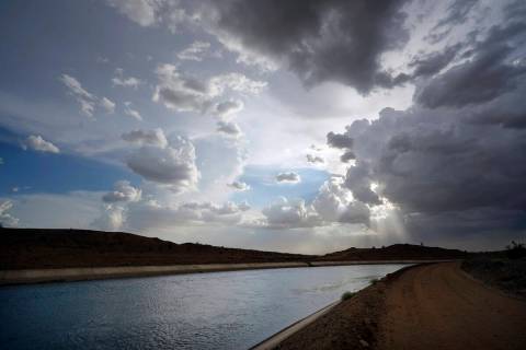 Water flows along the All-American Canal Saturday, Aug. 13, 2022, near Winterhaven, Calif. The ...