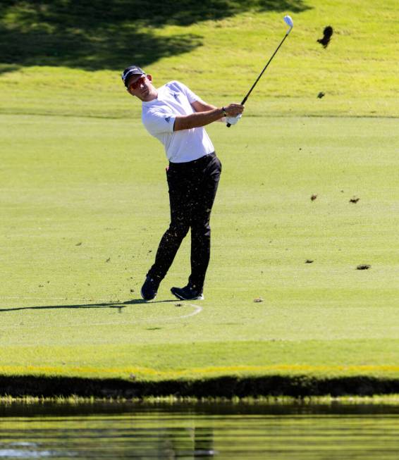 Lucas Herbert, of Australia, watches his drive to the sixteenth green during the first round of ...