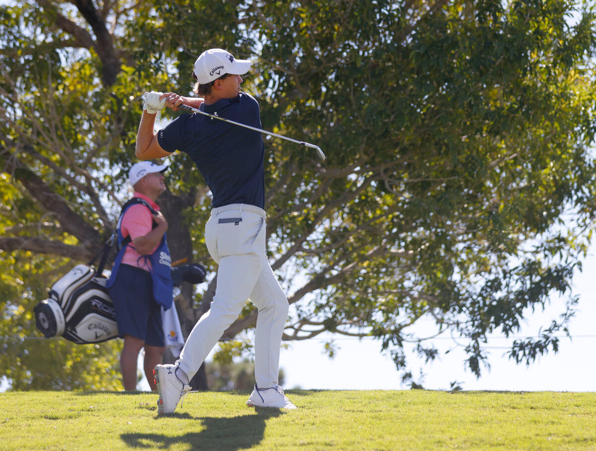 Maverick McNealy, of Las Vegas, watches his drive to the sixteen green during the first round o ...