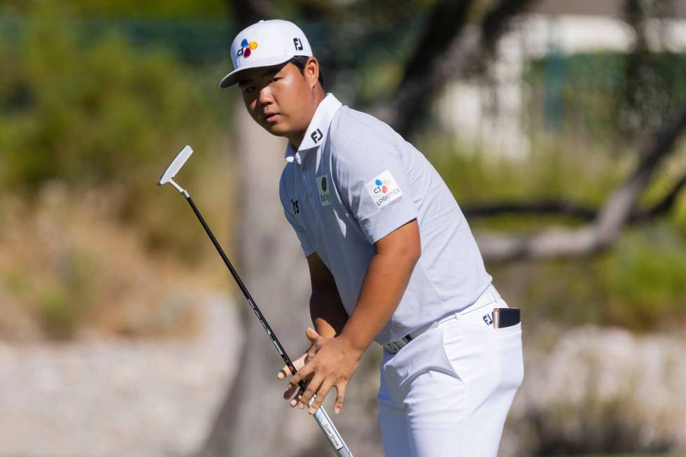 Tom Kim reacts after missing his putt on the second hole during the first round of the Shriners ...