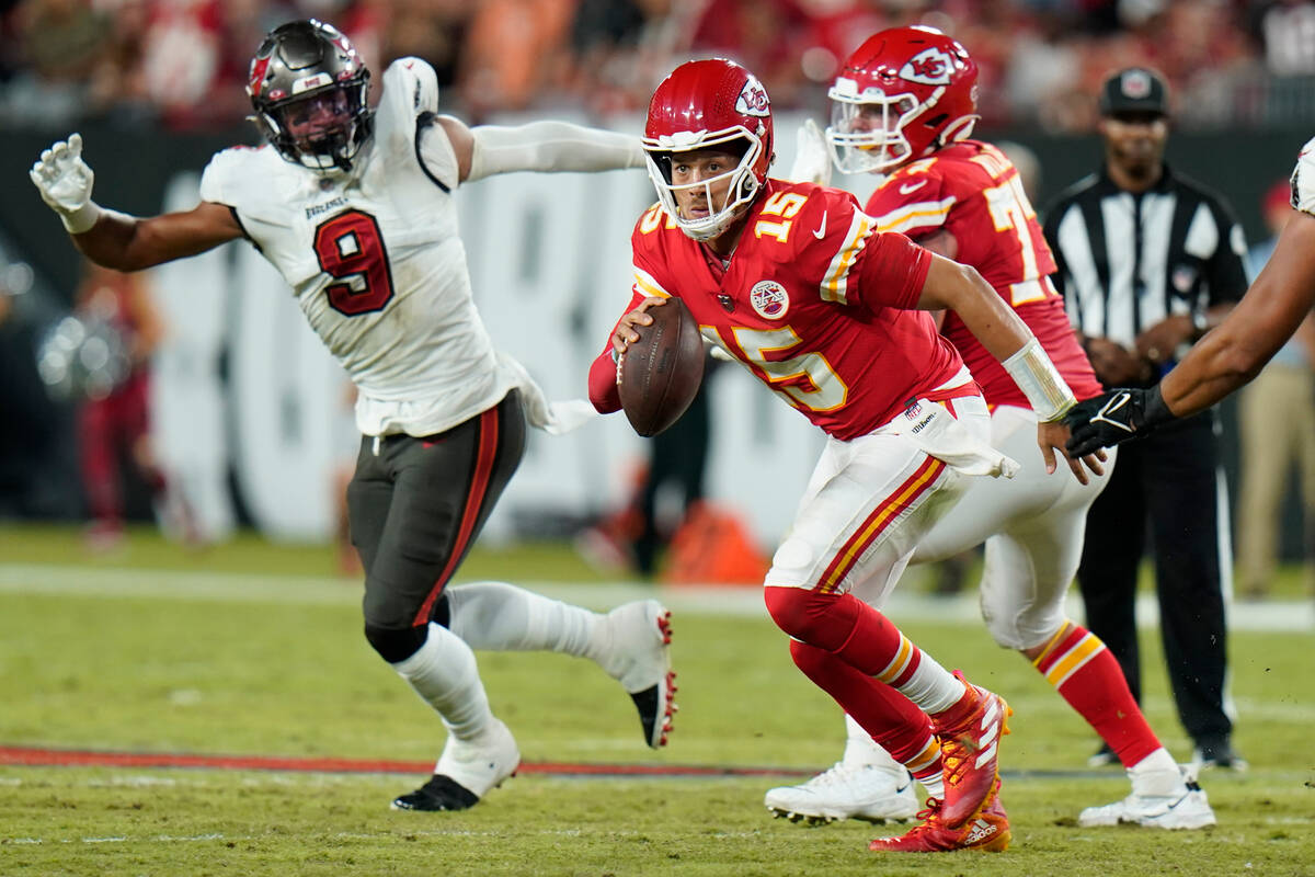 Kansas City Chiefs quarterback Patrick Mahomes runs against the Tampa Bay Buccaneers during the ...