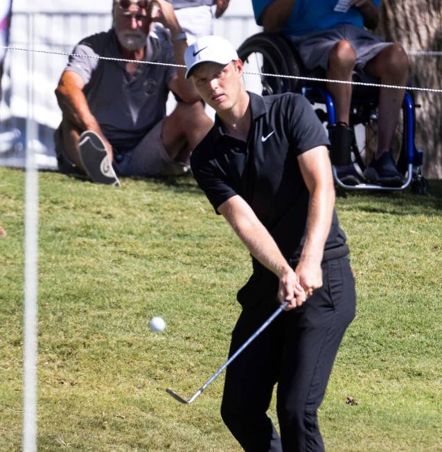 Cam Davis hits a chip shot to the ninth green during the second round of the Shriners Children' ...