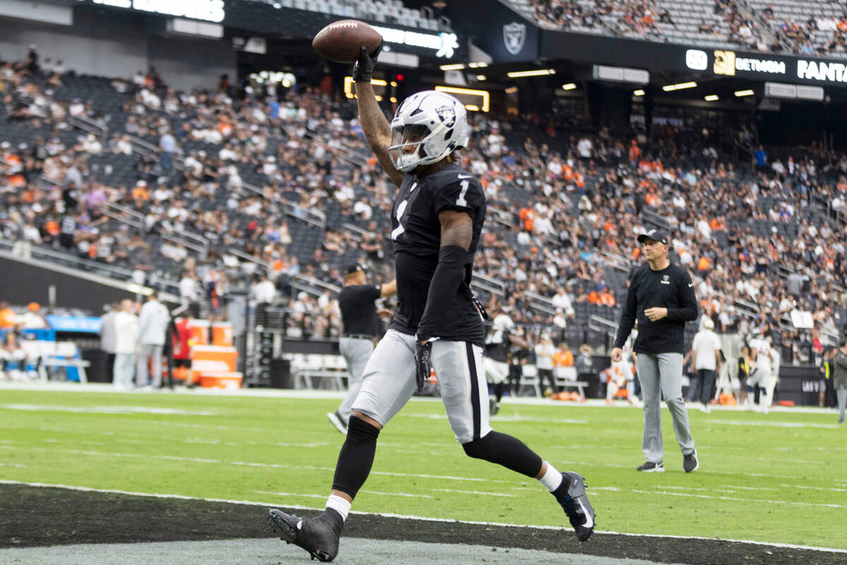 Raiders wide receiver Tyron Johnson (1) runs into the end zone during drills before an NFL game ...