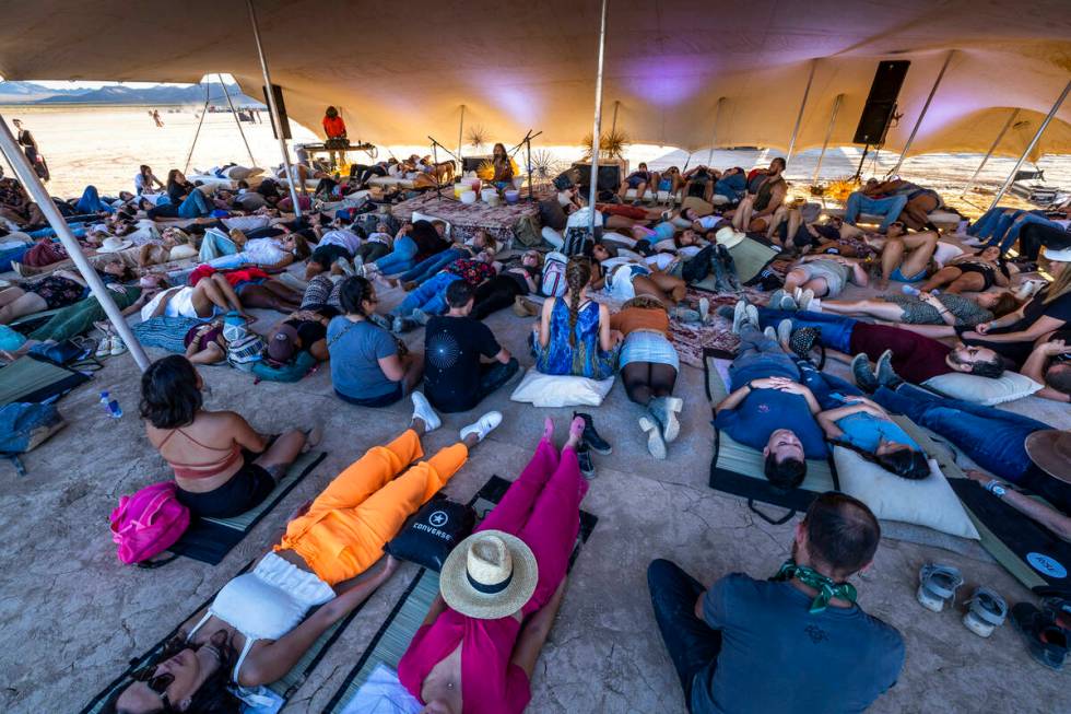Participants take in a soundbath meditation during the RiSE Lantern Fest at the Jean Dry Lake B ...