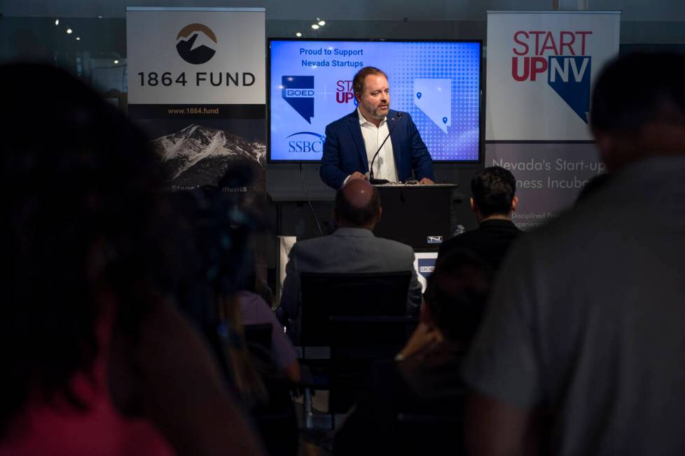 Nevada Treasurer Zach Conine speaks at a press conference to announce a new program that will p ...