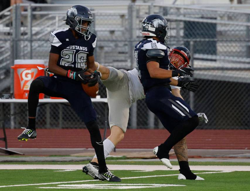 Shadow Ridge’s Jeremiah Campbell (20) intercepts a pass intended for Coronado’s ...