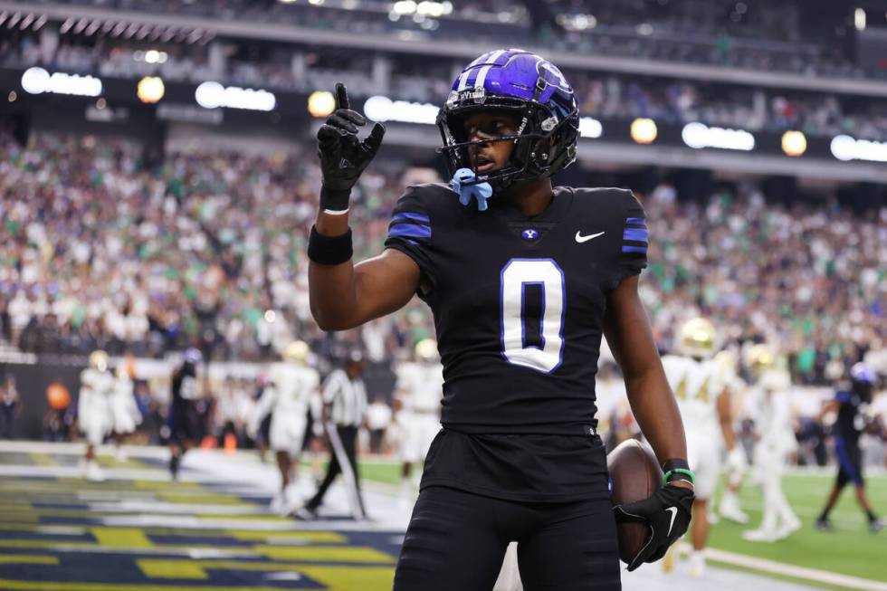 Brigham Young Cougars wide receiver Kody Epps (0) celebrates a touchdown catch during the first ...