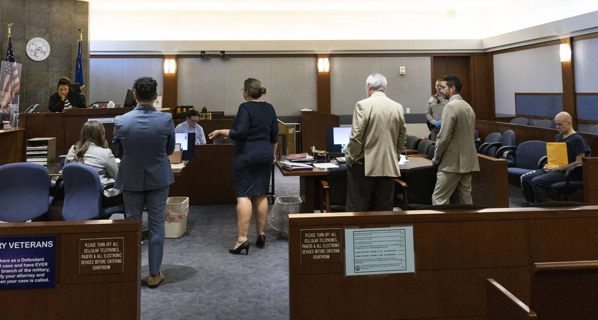 Maggie McLetchie, representing the Review-Journal, center, addresses the court as Judge Karen-B ...