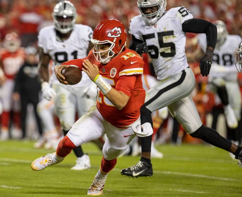 Kansas City Chiefs quarterback Patrick Mahomes (15) scrambles during the second half of an NFL ...