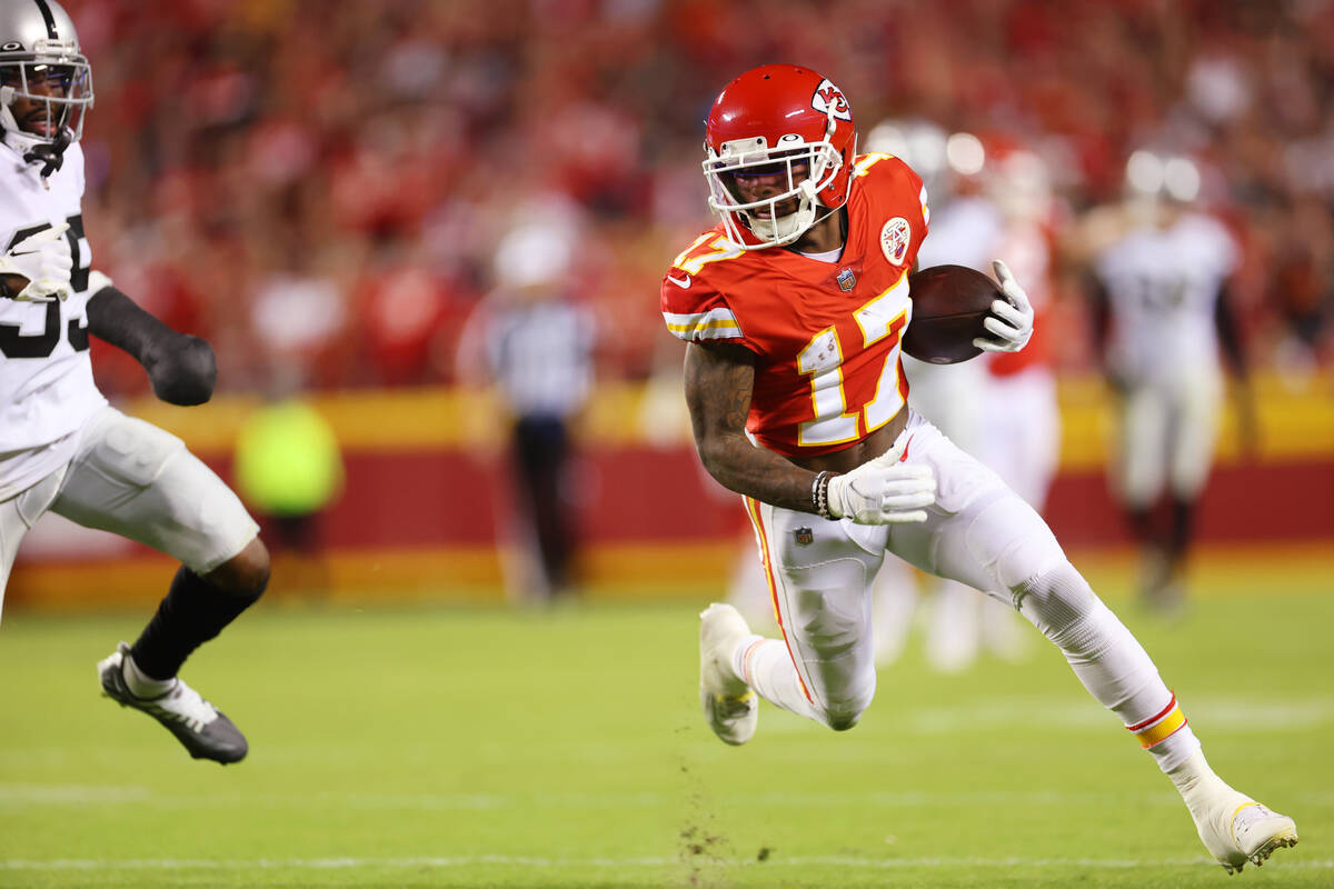 Kansas City Chiefs wide receiver Mecole Hardman (17) runs the ball against the Raiders during t ...