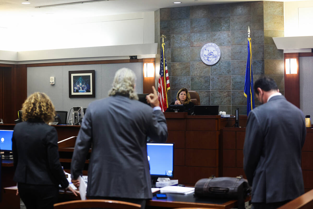 District Judge Susan Johnson addresses counsel during a hearing regarding the Review-Journal’ ...