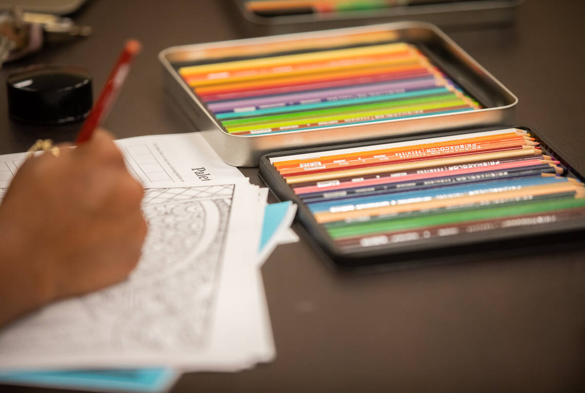 Royneqiuea Fields colors during an Adult Coloring and Journaling session at the Centennial Hill ...