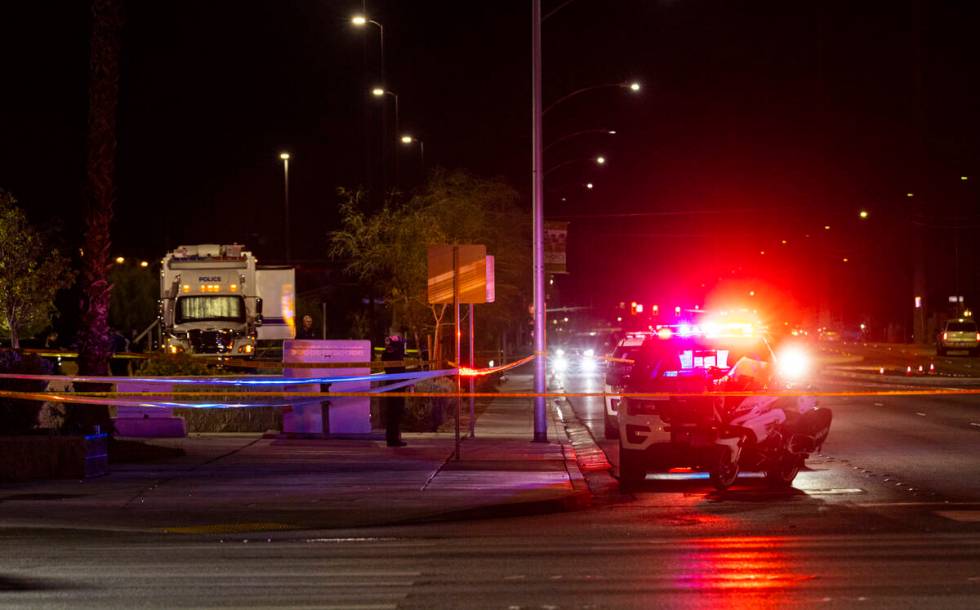 North Las Vegas police investigate the scene of an officer-involved shooting at Martin Luther K ...