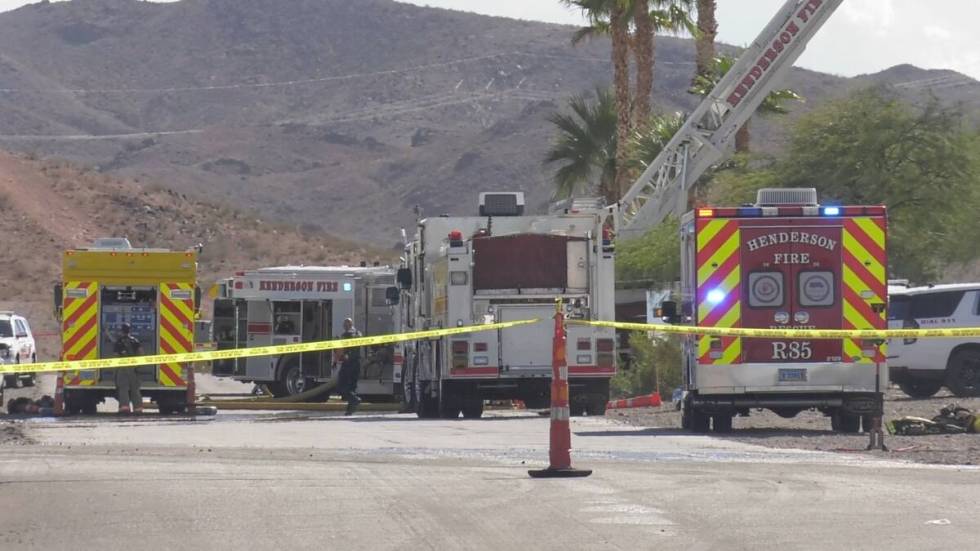 Emergency vehicles are seen, Tuesday, Oct. 11, 2022, near East Paradise Hills and College drive ...