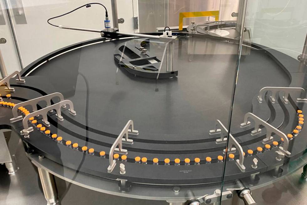 This photo provided by Pfizer in October 2022 shows manufacturing of the company's COVID-19 biv ...