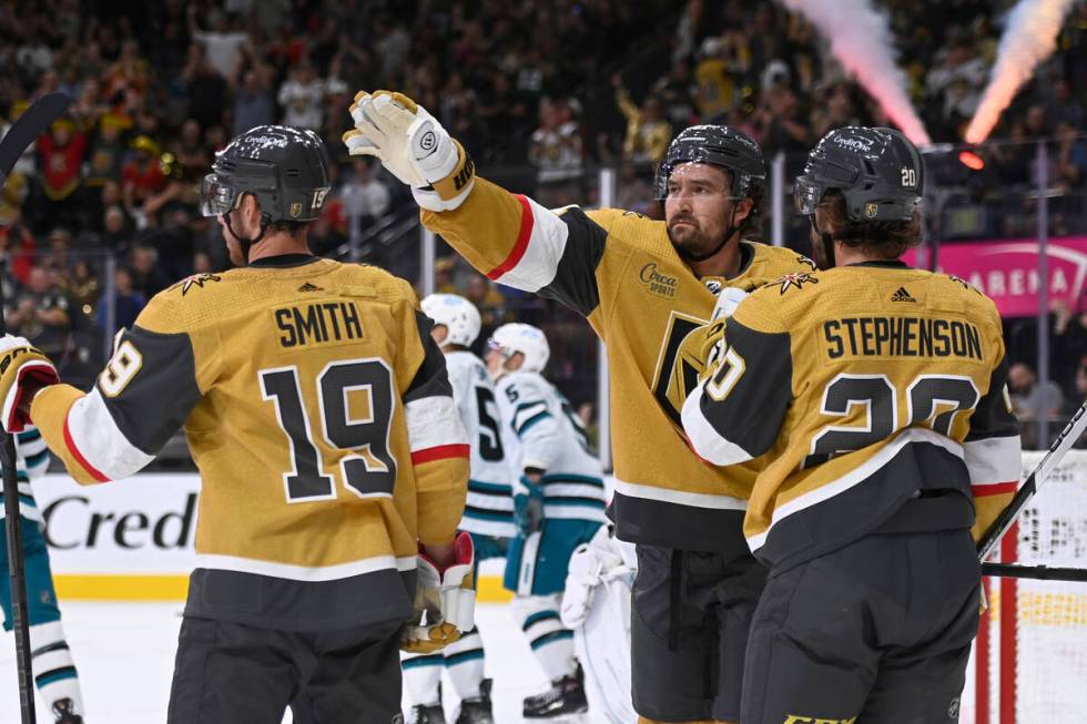 Vegas Golden Knights right wing Reilly Smith (19), right wing Mark Stone (61) and center Chandl ...