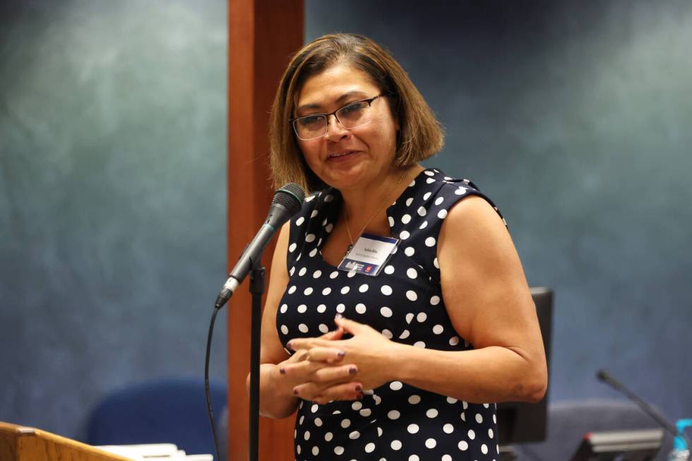 Fuilala Riley, president and CEO of Help of Southern Nevada, speaks during a press conference a ...