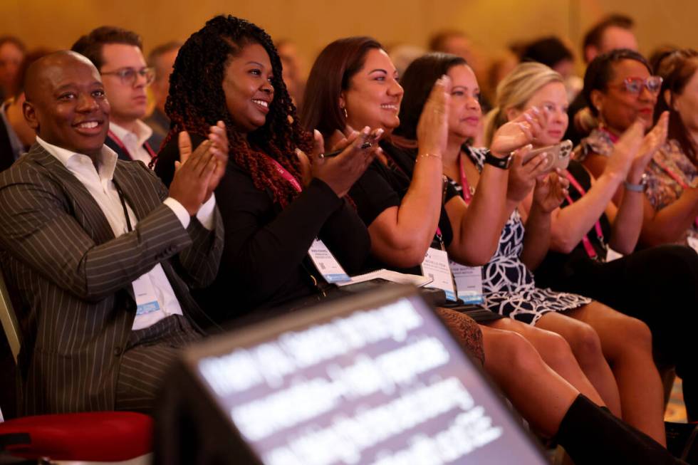 Audience members applaud as Raiders President Sandra Douglass Morgan talks to American Gaming A ...