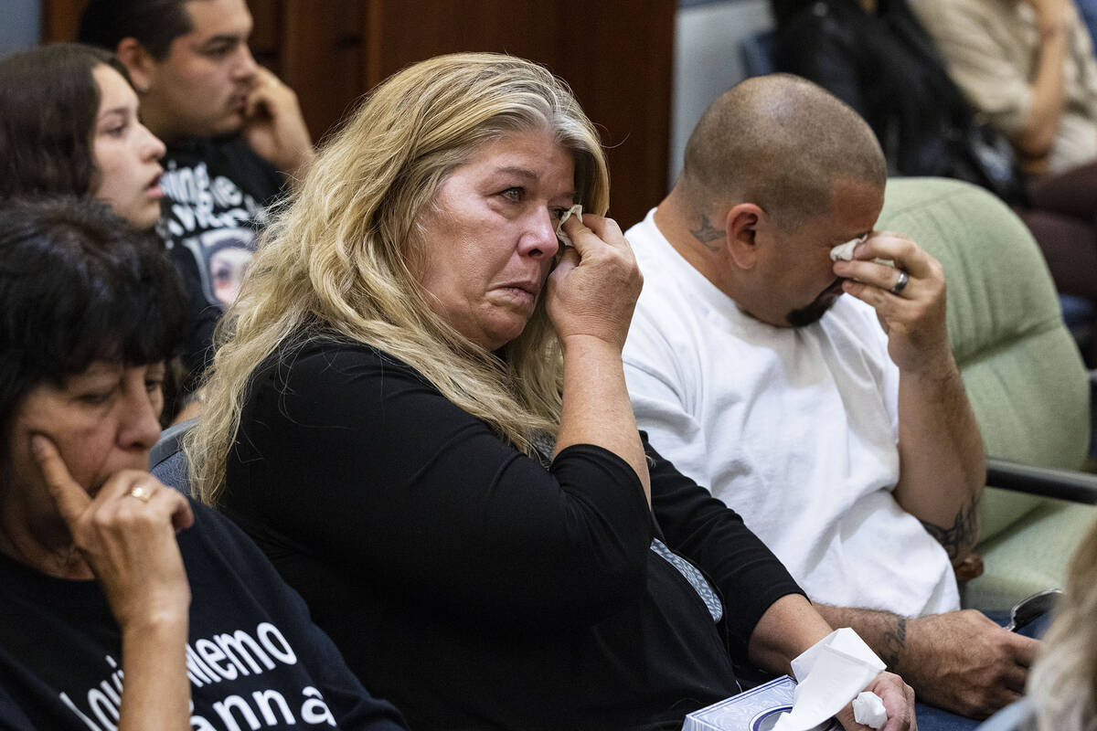Relatives of Avianna Cavanaugh, a drug overdose victim, weep as her mother, Theresa Keyes, read ...