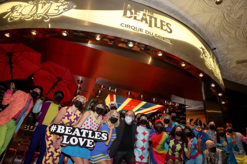 The cast of The Beatles LOVE entertain guests, employees, and fans during a celebratory pop-up ...