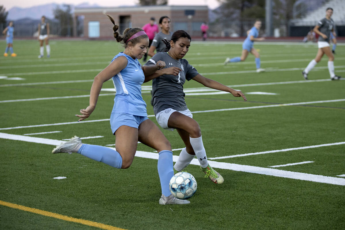Foothill’s Isabelle Simoneau, left, dribbles the ball while Arbor View’s Jazlyn C ...