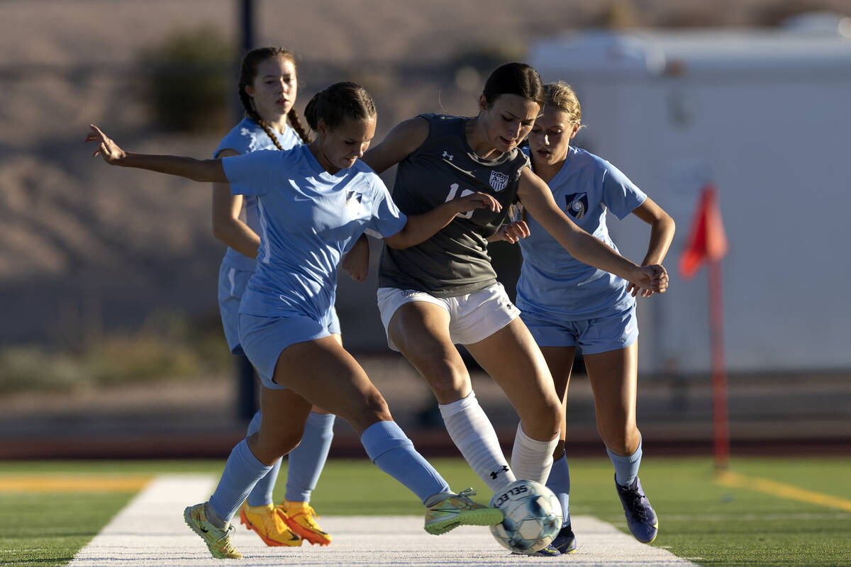 Foothill’s Raquel Pantalon, left, attempts to steal possession from Arbor View’s Bridget Gu ...
