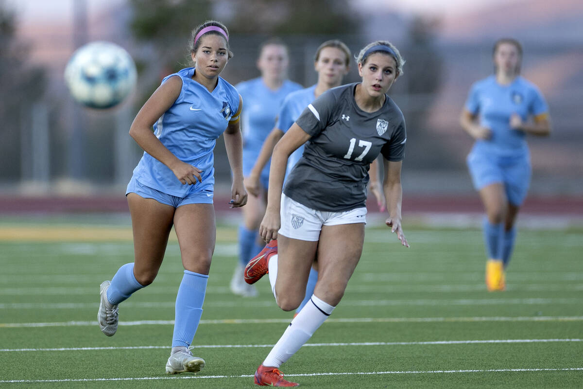 Foothill’s Isabelle Simoneau, left, and Arbor View’s Madison McCraw (17) watch a ...