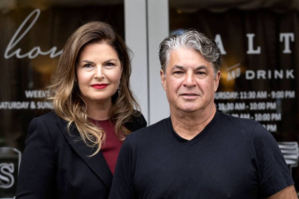 Owners of Honey Salt, married couple Elizabeth Blau and chef Kim Canteenwalla, outside their re ...
