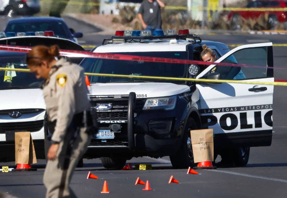 Las Vegas police investigate the scene on East Flamingo Road after a shooting that fatally woun ...