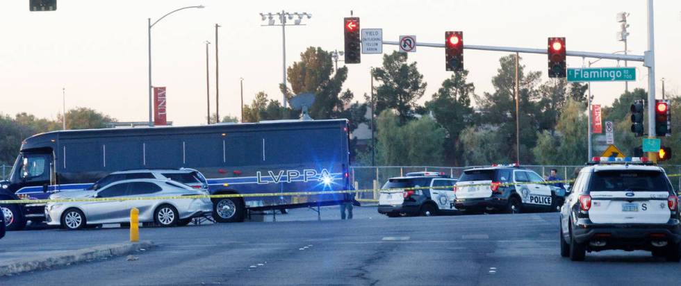 Las Vegas police investigate around the 800 block of East Flamingo Road after a shooting on Thu ...