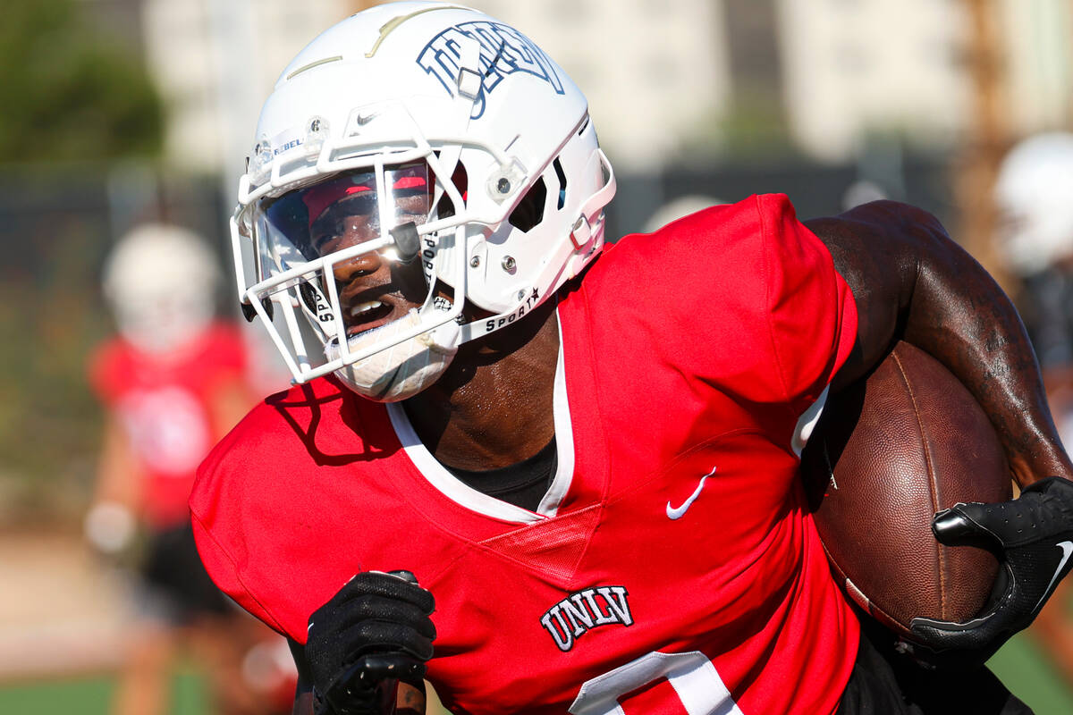 UNLV wide receiver Senika McKie runs the ball after a reception during football practice on Wed ...