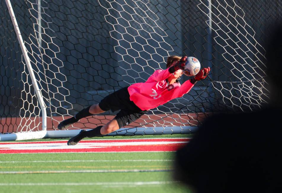 Desert Oasis goalkeeper Kenton Gelis (70) makes a save during a soccer game at Western High Sch ...